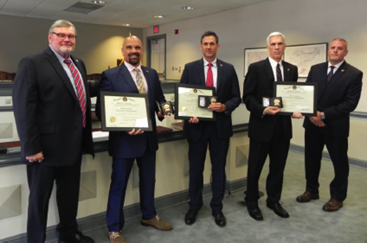 Acting-Prosecutor-Robert-J.-Carroll,-Lieutenant-Mark-L.-Castellano,-Lieutenant-Michael-L.-Gomez,-Lieutenant-Joseph-Soulias,-and-Chief-of-Detectives-Christoph-Kimker