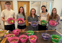 Madison High School Key Club Members Assemble Easter Baskets for Homeless Solutions